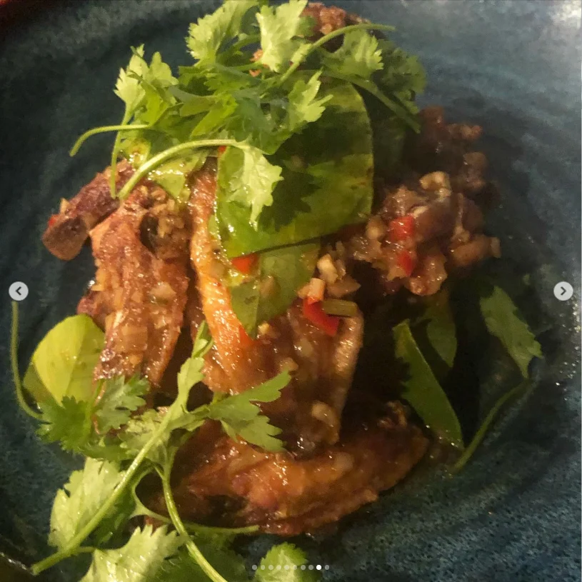 An evening terrace meal with wine and a breeze — Haruru’s photograph