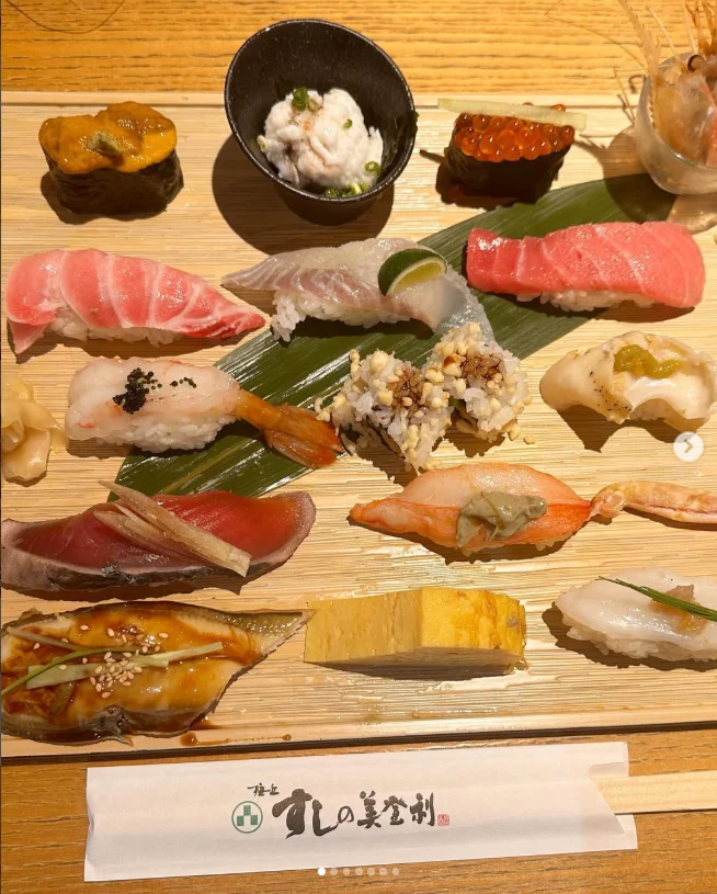 Seasonal omakase nigiri and seafood salad — Haruru’s photograph