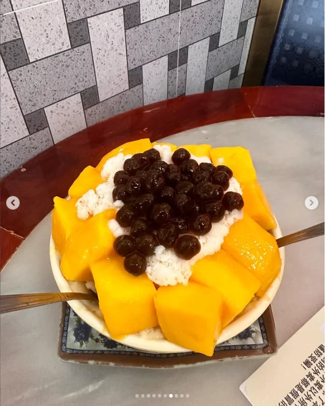 Delighted by the ripe, sweet mango — Haruru’s photograph