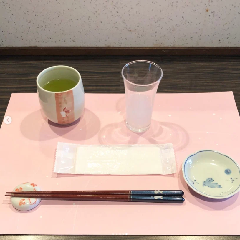A small shop, with rabbits at the table — Haruru’s photograph