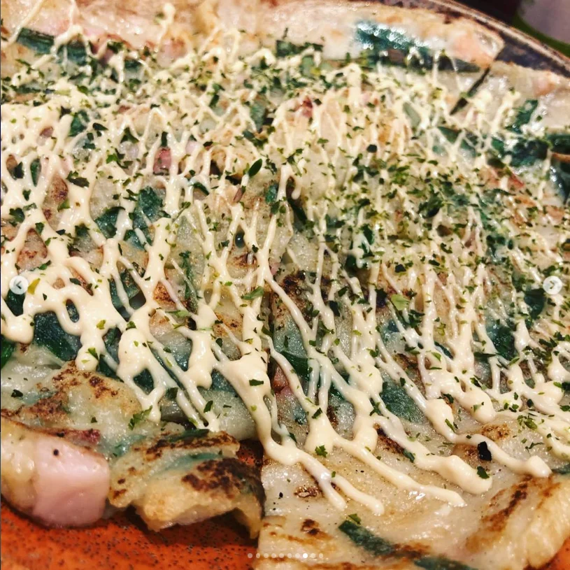 The last night brought a table of island dishes — Haruru’s photograph