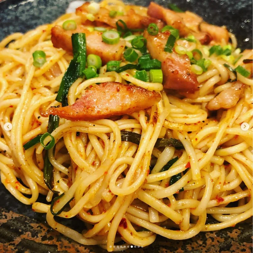 The last night brought a table of island dishes — Haruru’s photograph
