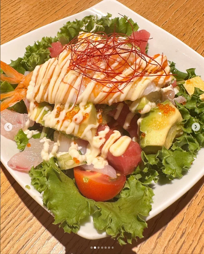 Seasonal omakase nigiri and seafood salad — Haruru’s photograph