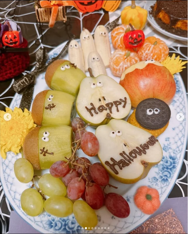 Faces across the party table — Haruru’s photograph