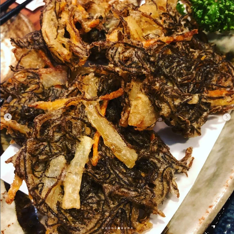 The last night brought a table of island dishes — Haruru’s photograph