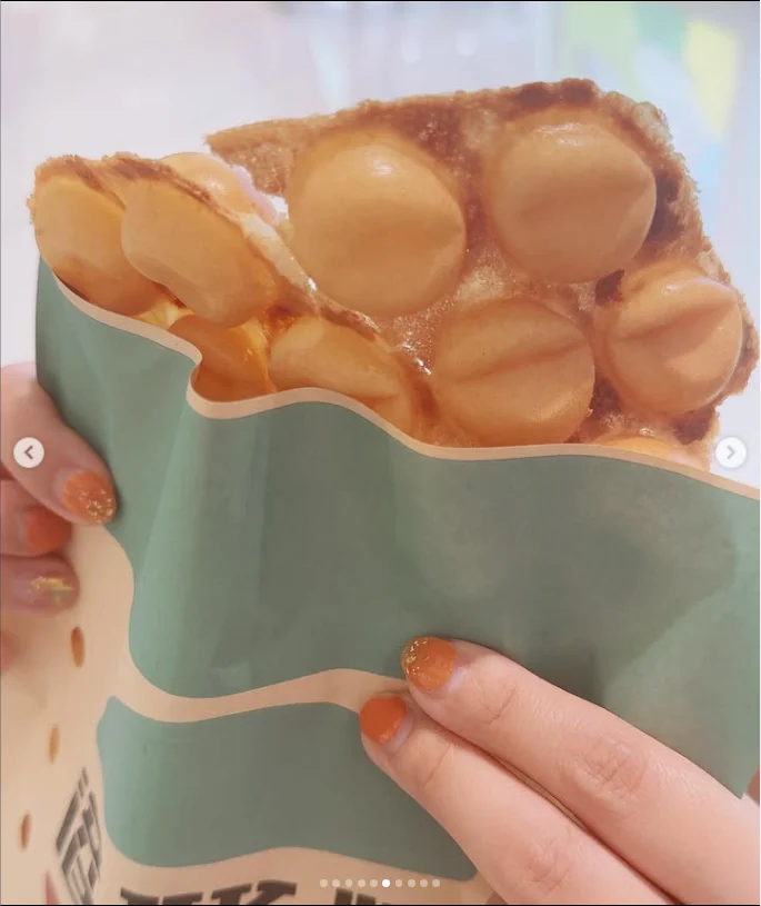 The cheese-flavoured waffle she had missed the day before — Haruru’s photograph