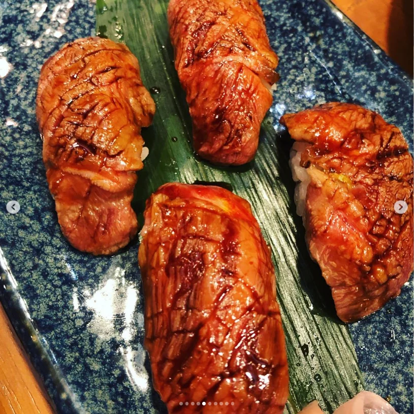 The last night brought a table of island dishes — Haruru’s photograph